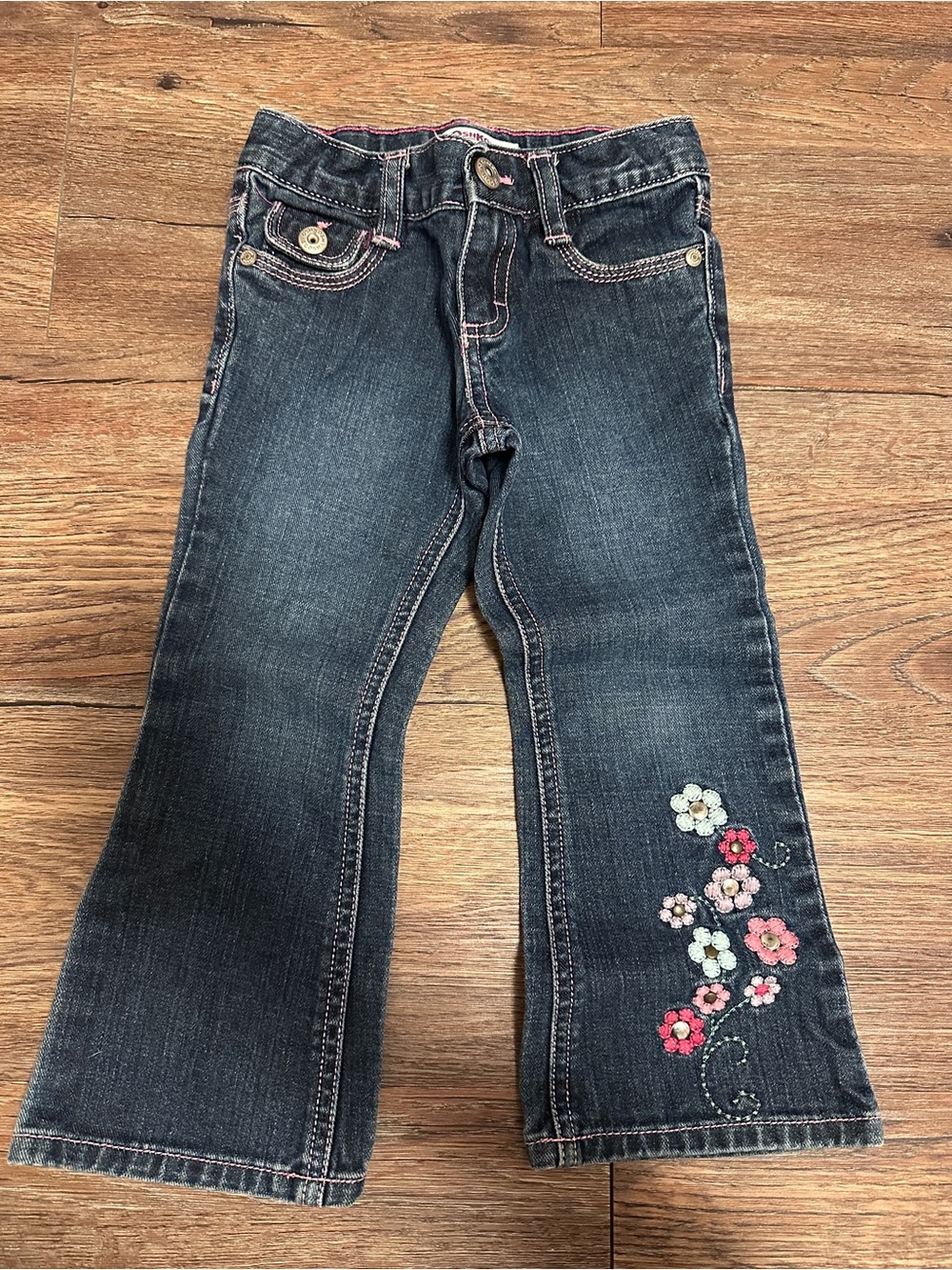 OshKosh B'gosh Dark Wash Jeans with Floral Embroidery and Pink Accents